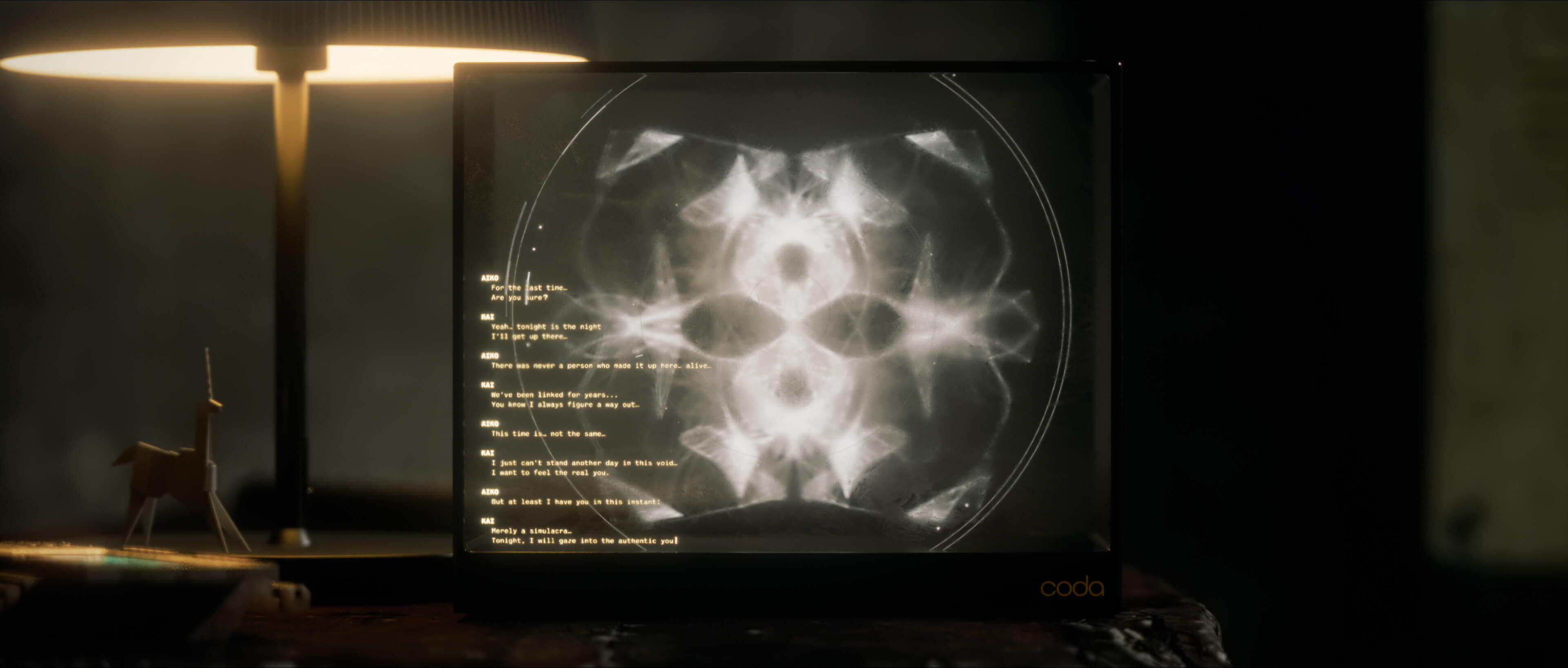 The dream machine's mandala interface beside a desk lamp