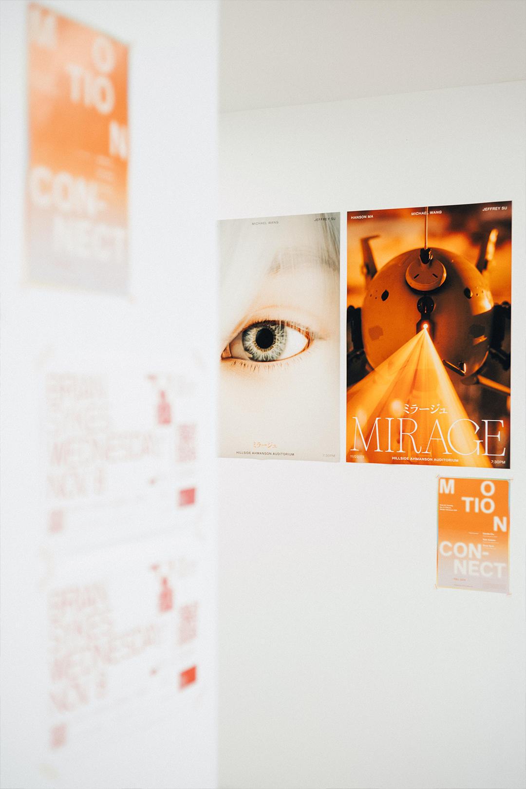 Poster pair hung beside the Motion Connect flyers